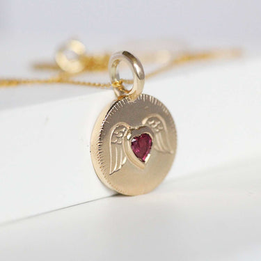 ruby heart gold angel wing coin necklace
