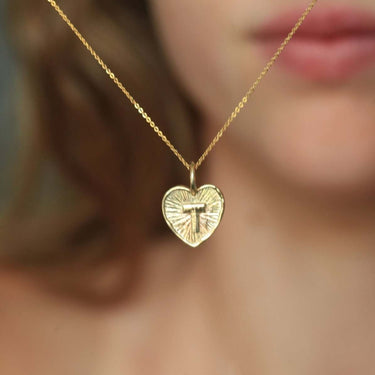 gold heart necklace with initial