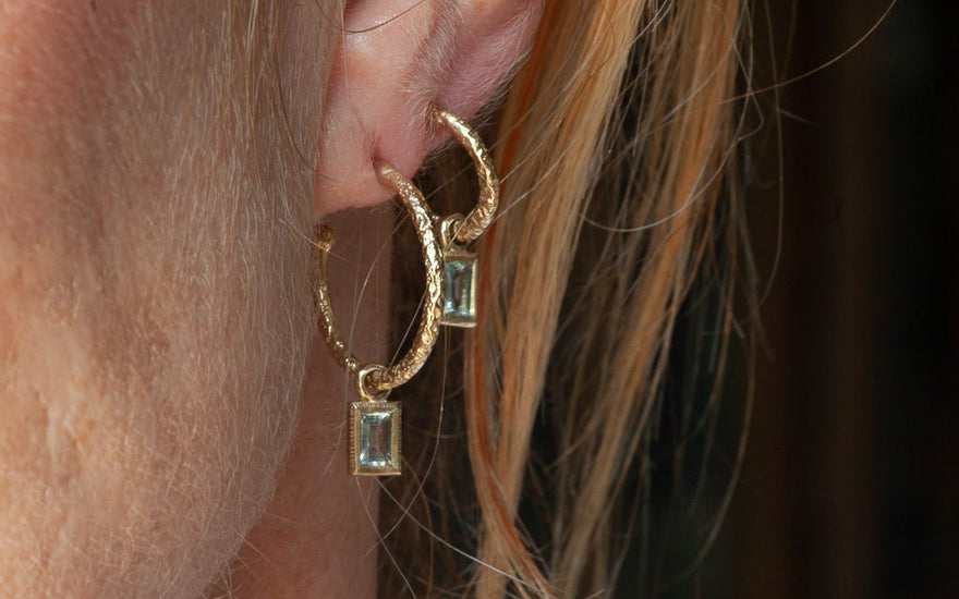 Hoop earrings with charms 