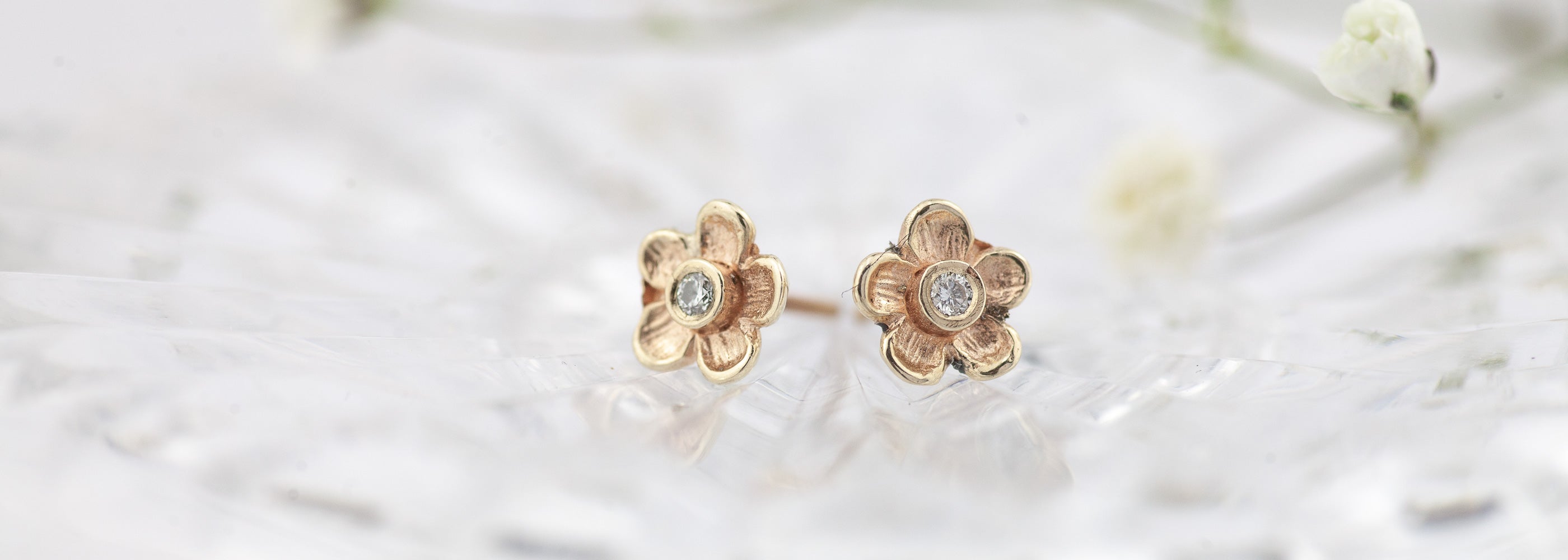 Gold and silver flower earrings