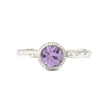 Purple amethyst ring with silver ring band 
