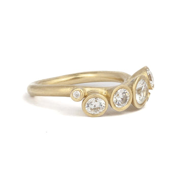 Asymmetric Diamond Ring With organic band and seven diamonds