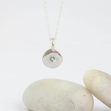 round silver necklace with aquamarine 