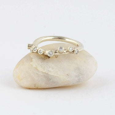 Quirky Half Bezel Engagement Ring 