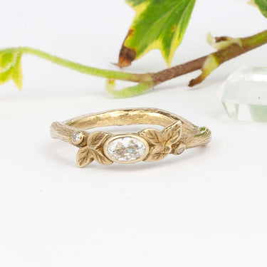 Leaf ring with diamonds