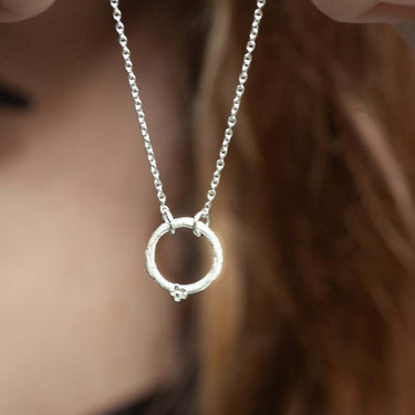 silver necklace with circle charm